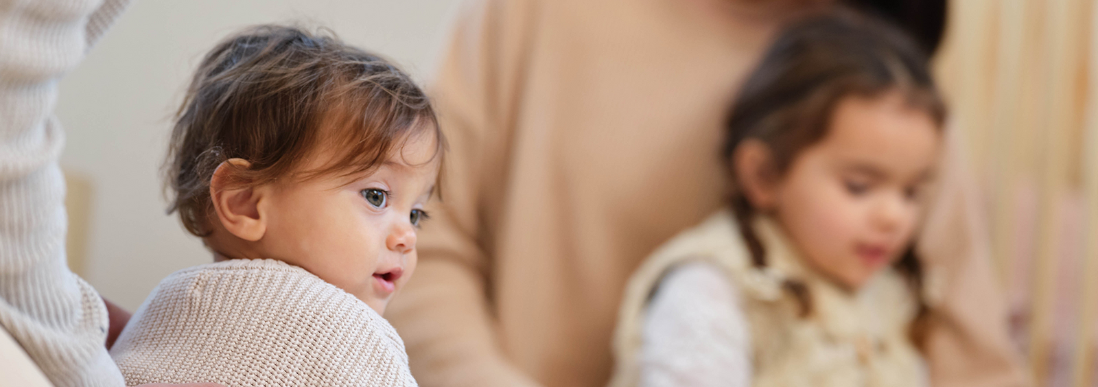 Toddler playing on the ground 